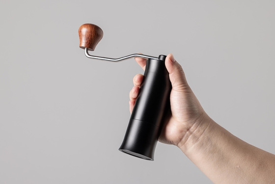 Manuelle tragbare Kaffeemühle Mini Kaffeebohnenmühle für den Heimgebrauch