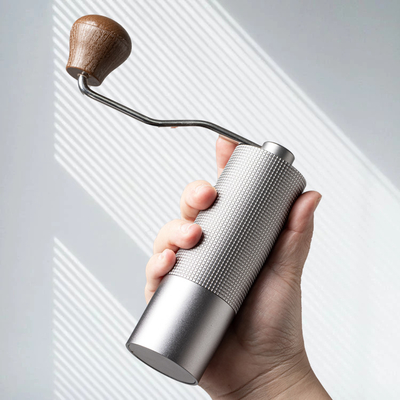 Tragbare Mini Small Hand Manual Burr-Kaffeemühle Stainless Steel Homeuse